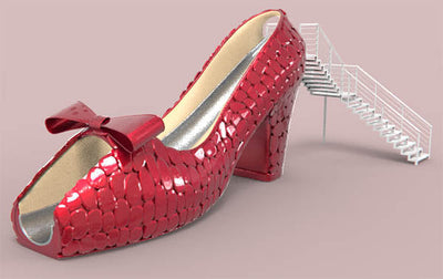 Small City Dedicated to Oz's Dorothy Gale Unveils Giant Ruby Slipper Slide