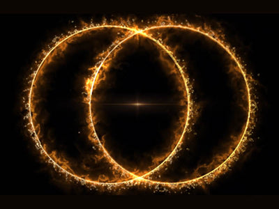 A Pair of Golden Cosmic Hoops: The Universe's Most Dazzling Mystery