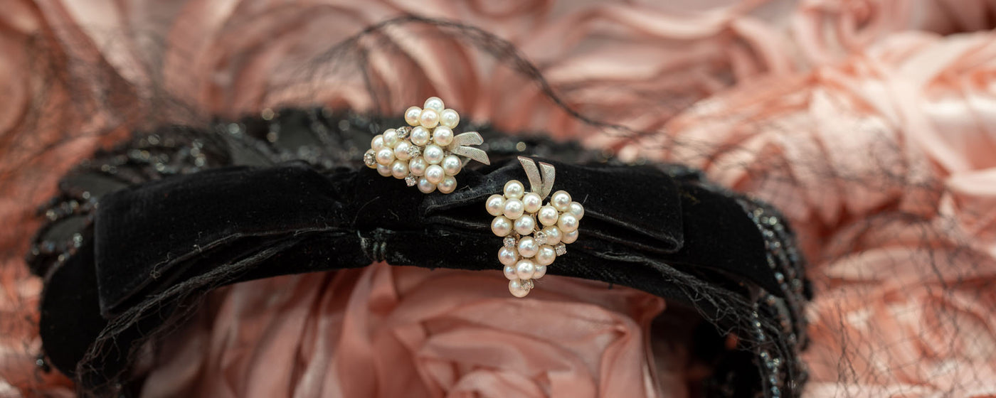 Estate pearl grape cluster earrings.
