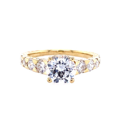 Round Diamond Side Stone Engagement Ring in Yellow Gold
