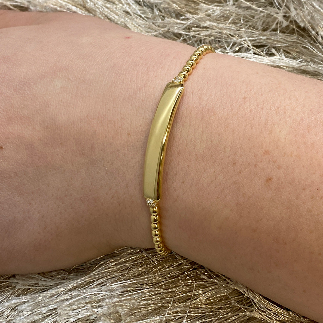 Engraveable Bar Expandable Bracelet in Yellow Gold by Hulchi Belluni