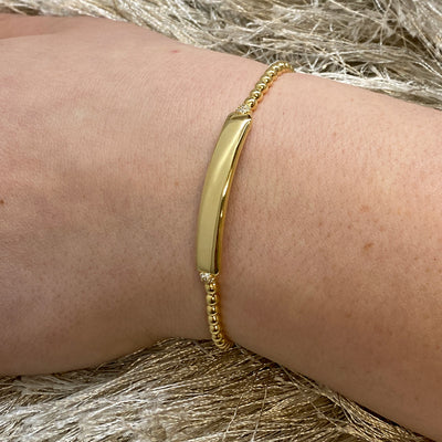 Engraveable Bar Expandable Bracelet in Yellow Gold by Hulchi Belluni