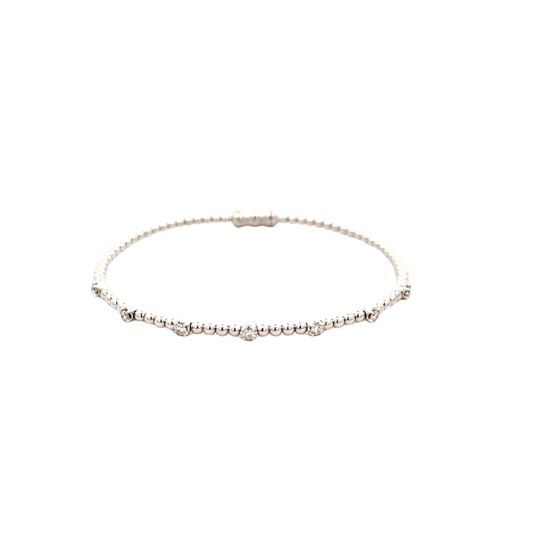 Seven Station Diamond Bujukan Bangle in White Gold by Gabriel & Co.