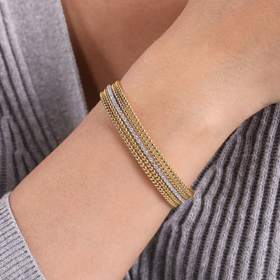 Wide Bujukan Diamond Beaded Bangle in Yellow Gold by Gabriel & Co.