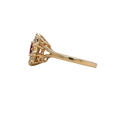 ESTATE Ruby and Diamond Halo Ring in Yellow Gold