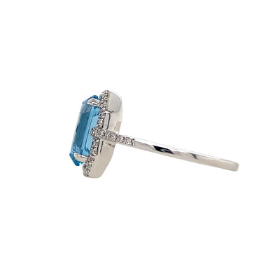 Blue Topaz and Diamond Halo Style Ring in White Gold