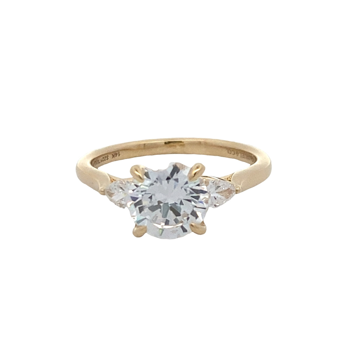 Three Stone Engagement Ring in Yellow Gold by Gabriel & Co.