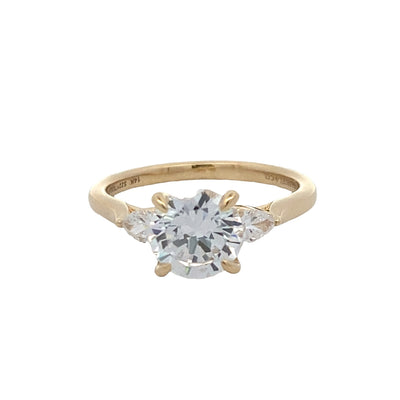 Three Stone Engagement Ring in Yellow Gold by Gabriel & Co.