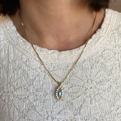 ESTATE Blue and White Diamond Pendant in Yellow Gold