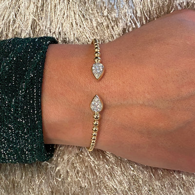 Pear Shaped End Diamond Cuff in Yellow Gold by Gabriel & Co.