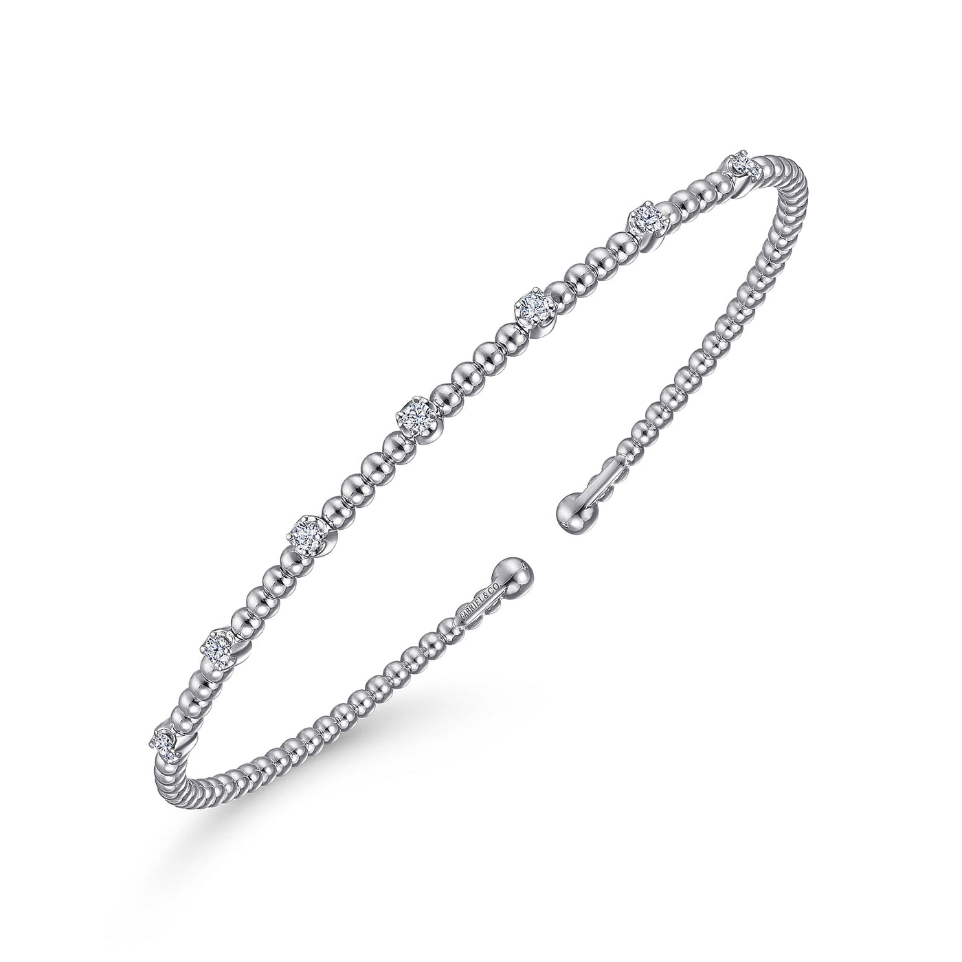 Seven Station Diamond Bujukan Bangle in White Gold by Gabriel & Co.