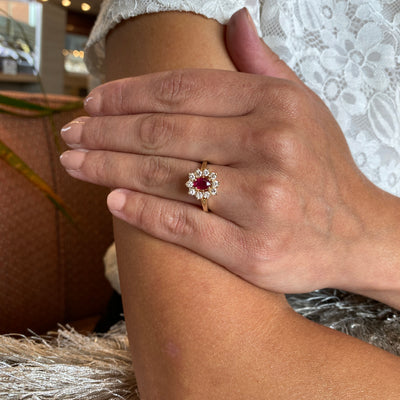 ESTATE Ruby and Diamond Halo Ring in Yellow Gold