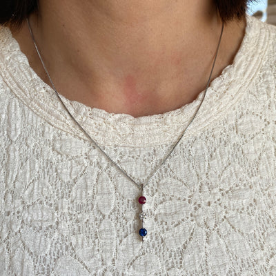 ESTATE Ruby, Diamond, and Sapphire Pendant in White Gold