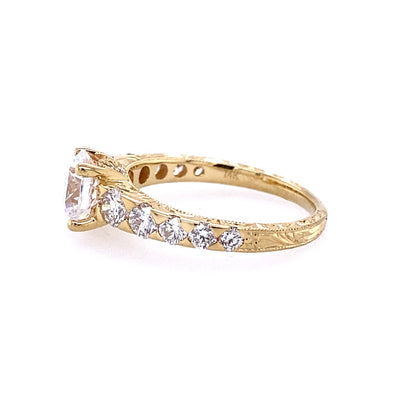 Round Diamond Side Stone Engagement Ring in Yellow Gold