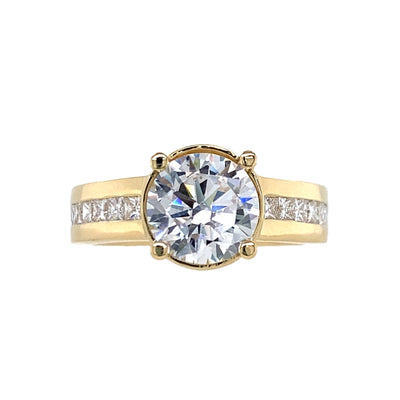 Round Center with Side Stone Engagement Ring in Yellow Gold by Gabriel & Co.
