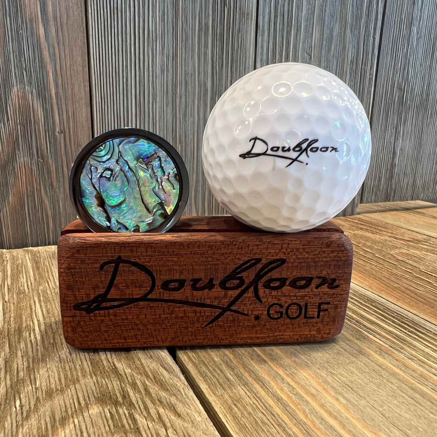 The Dark Ocean Golf Ball Marker in Titanium