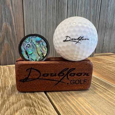 The Dark Ocean Golf Ball Marker in Titanium