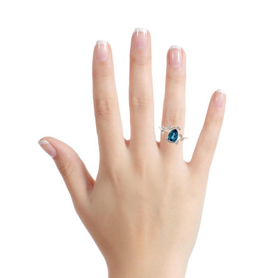 London Blue Topaz Floral Ring in White Gold by Allison Kaufman