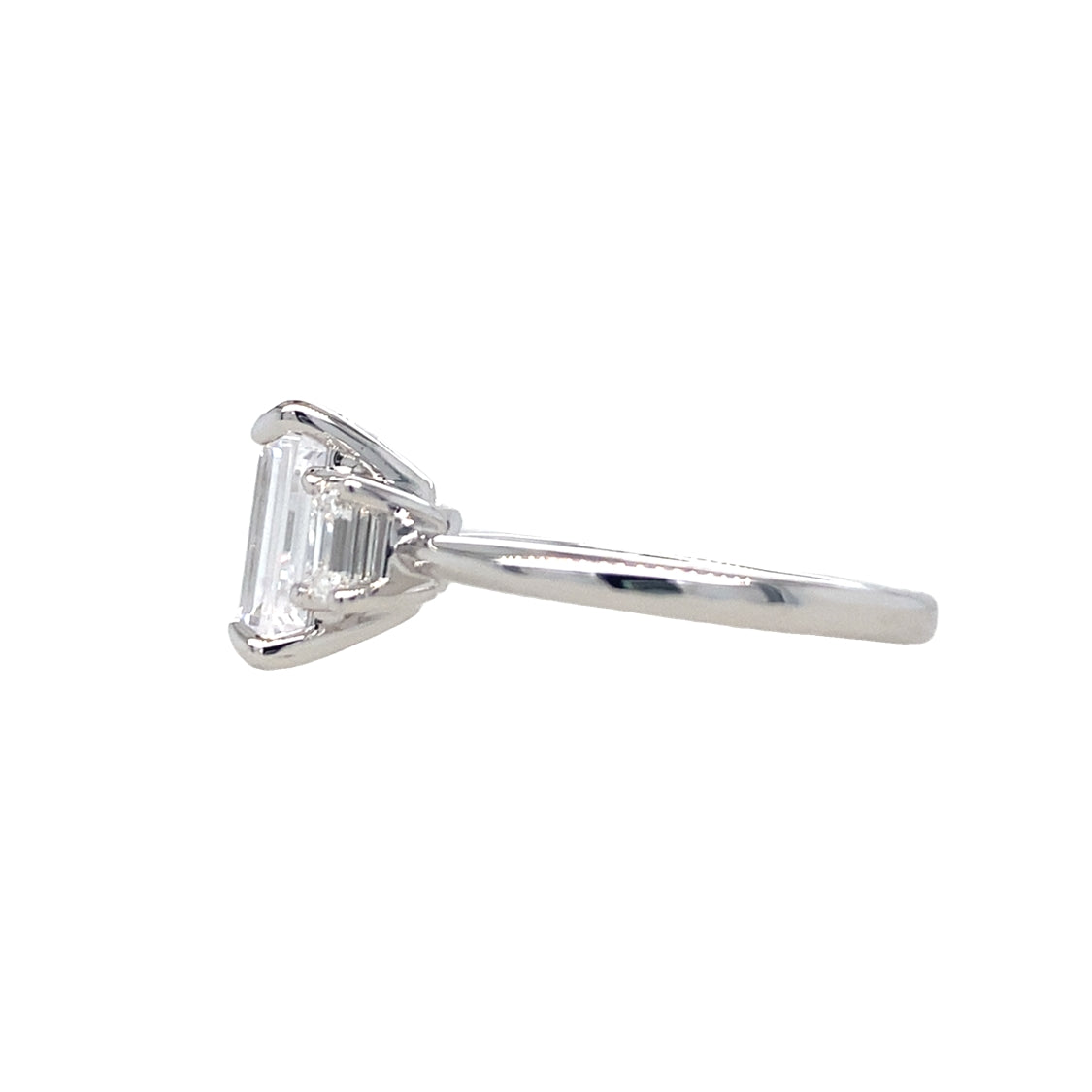 Three Stone Emerald Cut Ring in White Gold by Gabriel & Co.