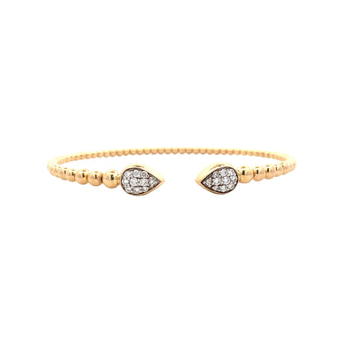 Pear Shaped End Diamond Cuff in Yellow Gold by Gabriel & Co.
