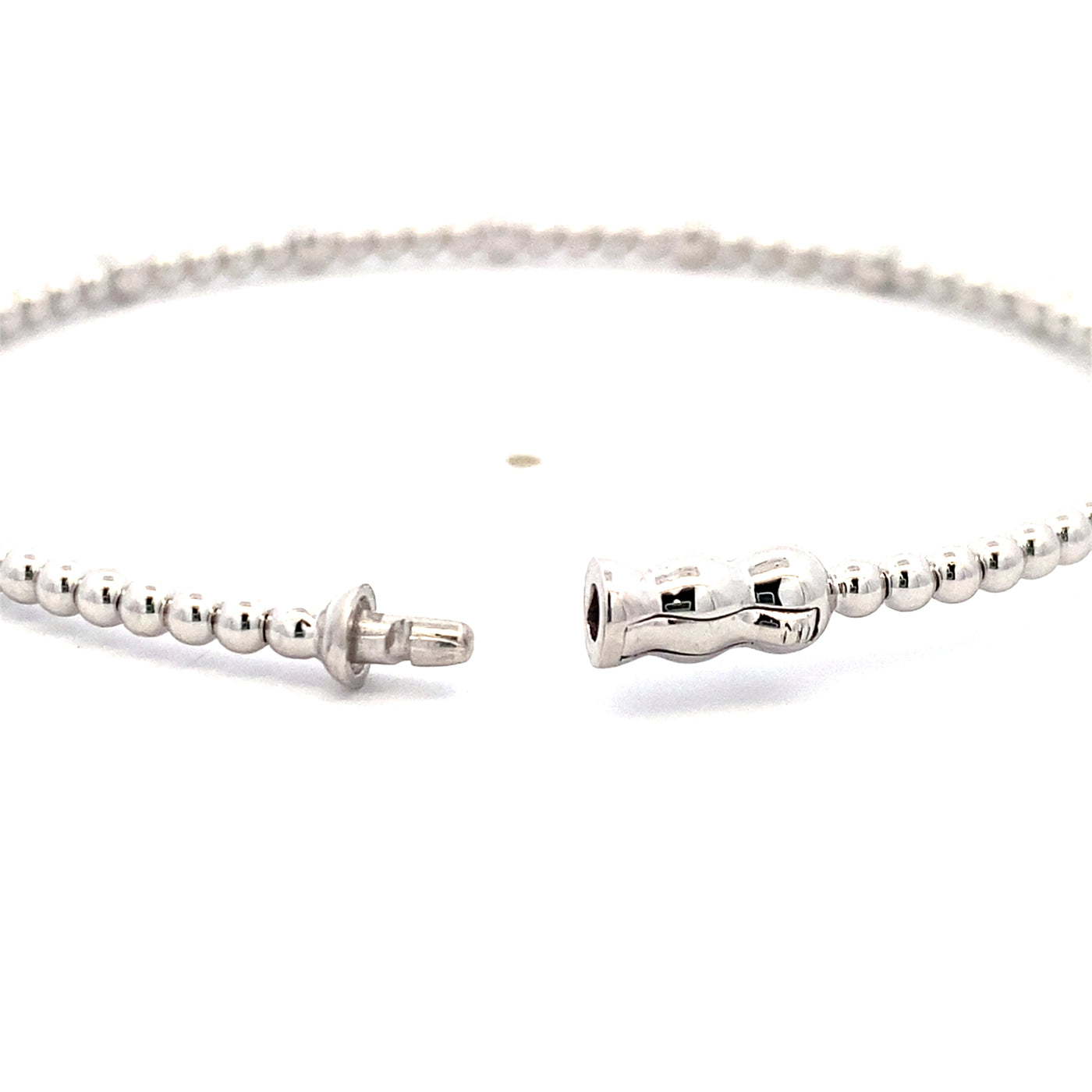 Seven Station Diamond Bujukan Bangle in White Gold by Gabriel & Co.