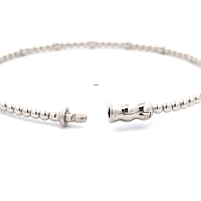 Seven Station Diamond Bujukan Bangle in White Gold by Gabriel & Co.
