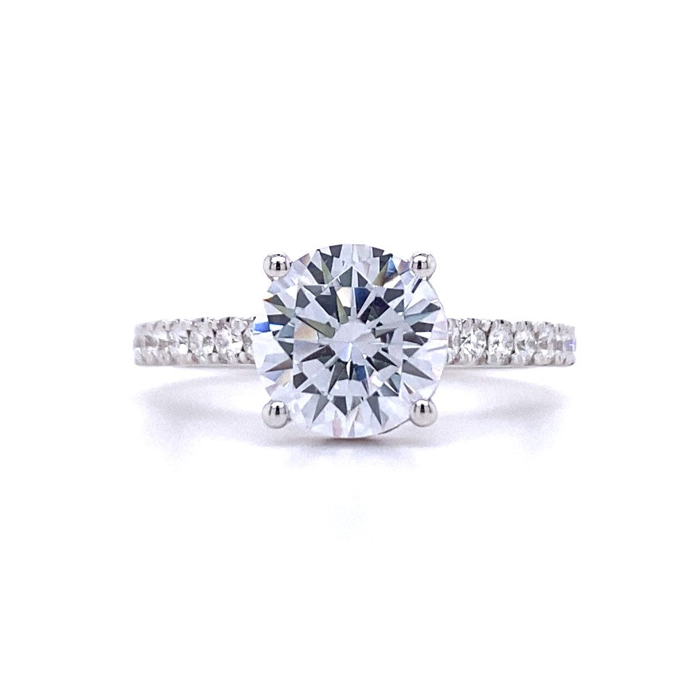 Round Diamond Side Stone Engagement Ring in White Gold by Simon G