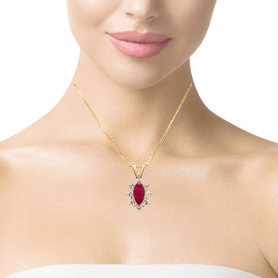 ESTATE Ruby and Diamond Pendant in Yellow Gold