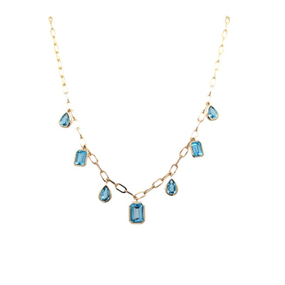 Swiss Blue Topaz Station necklace in Yellow Gold