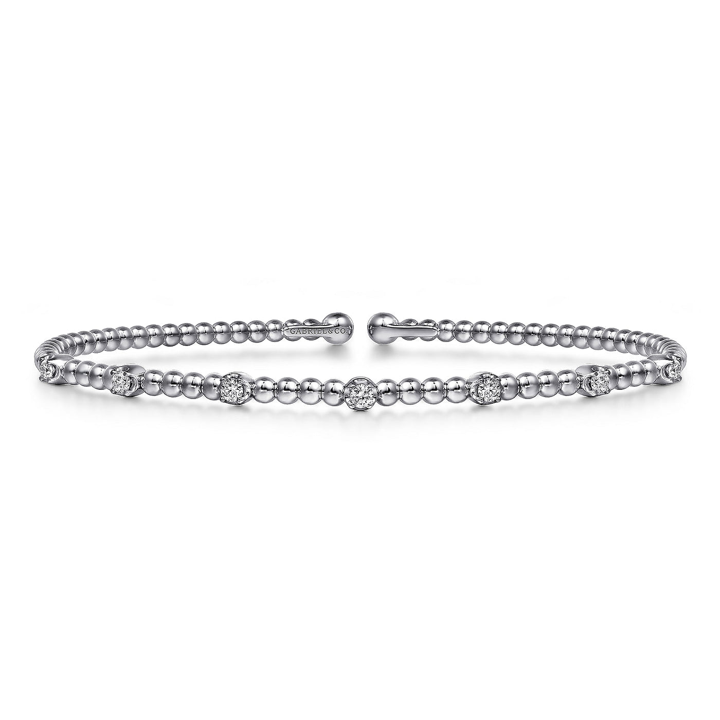 Seven Station Diamond Bujukan Bangle in White Gold by Gabriel & Co.